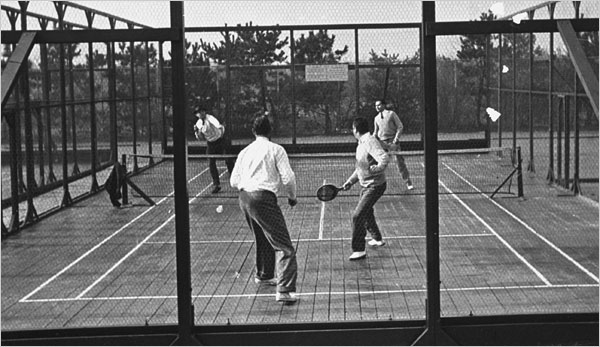 Platform tennis, above, originated in New York’s Westchester County and was featured in Life magazine in 1940. It was modeled after paddle tennis, left, which is played on a smaller court, which might explain why John McEnroe was trying it.