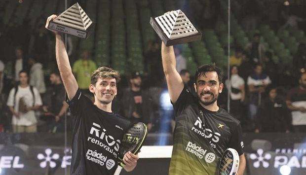 Pablo Lima and Franco Stupaczuk celebrate with their trophies after winning the first edition of the NEWGIZA Premier Padel P1 in Newgiza, Egypt, on Sunday.